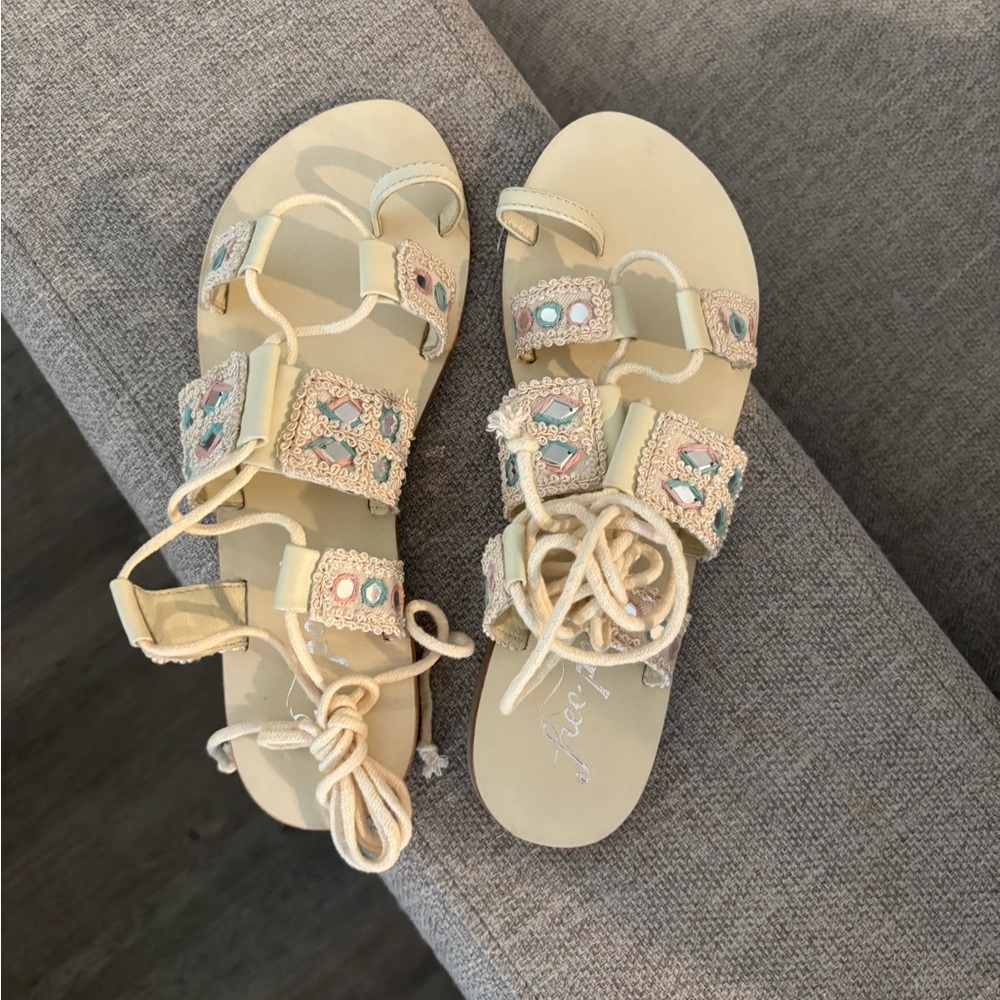 Never worn free people lace up sandals size 38 1/2 (women’s 8.5)